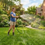 an image of watering grass in lawn